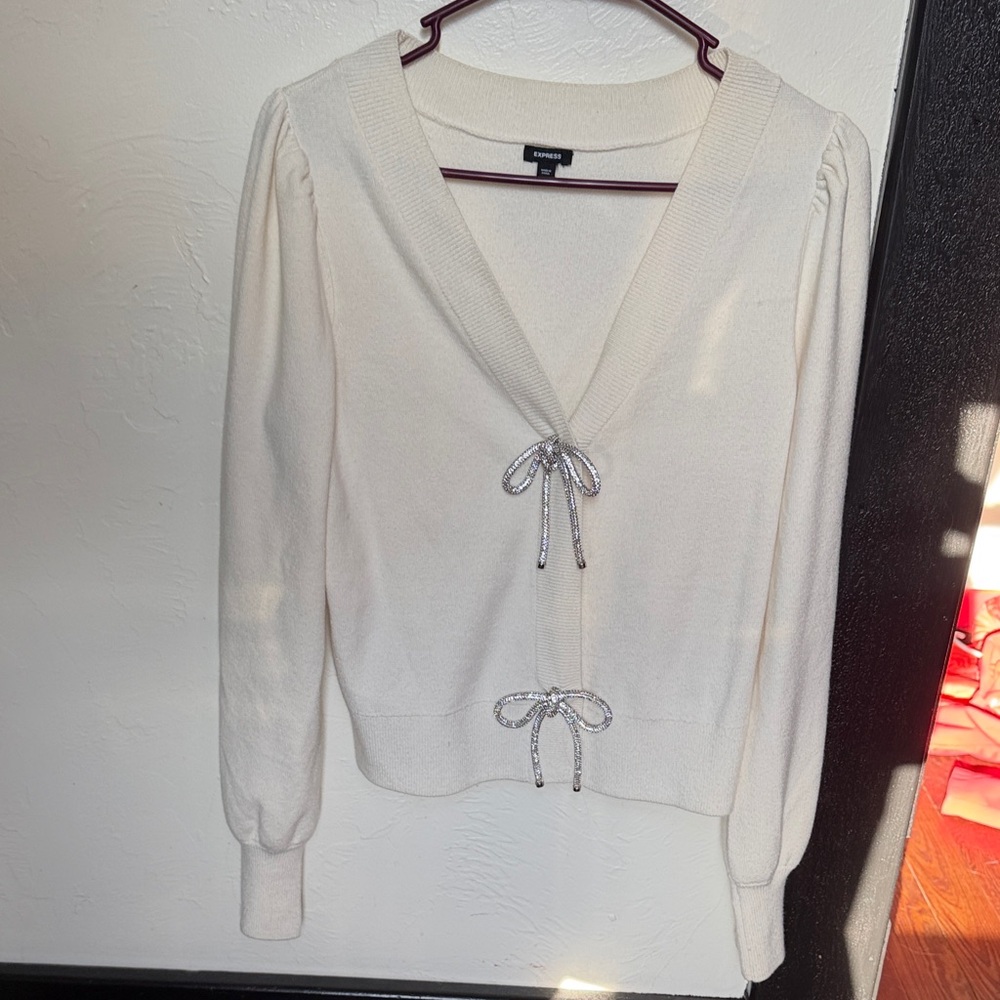 Express Cream Cardigan with Silver Bow Accents